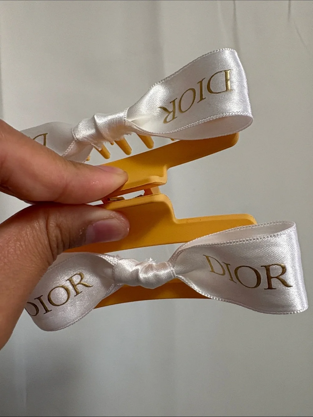 Dior Luxurious white and Gold Ribboned Hair Clip